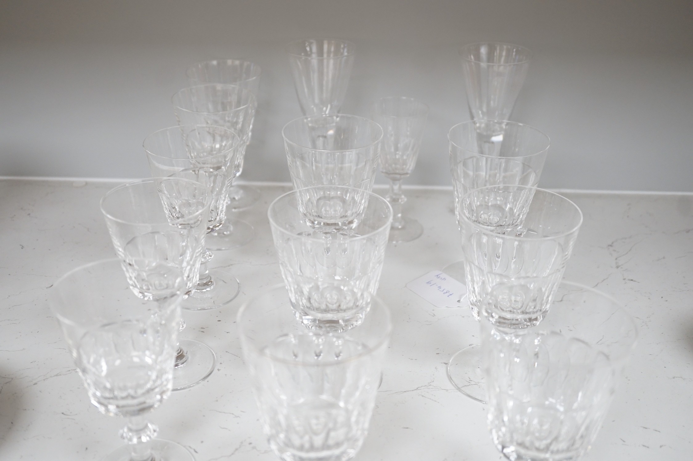 A set of nine cut drinking glasses, five similar glasses and three others